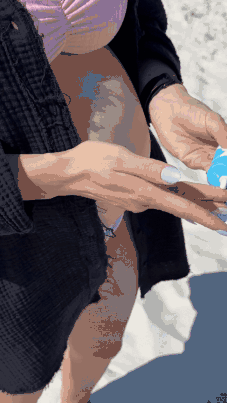 Applying HolyCow's Wildara Sunscreen sunscreen on skin